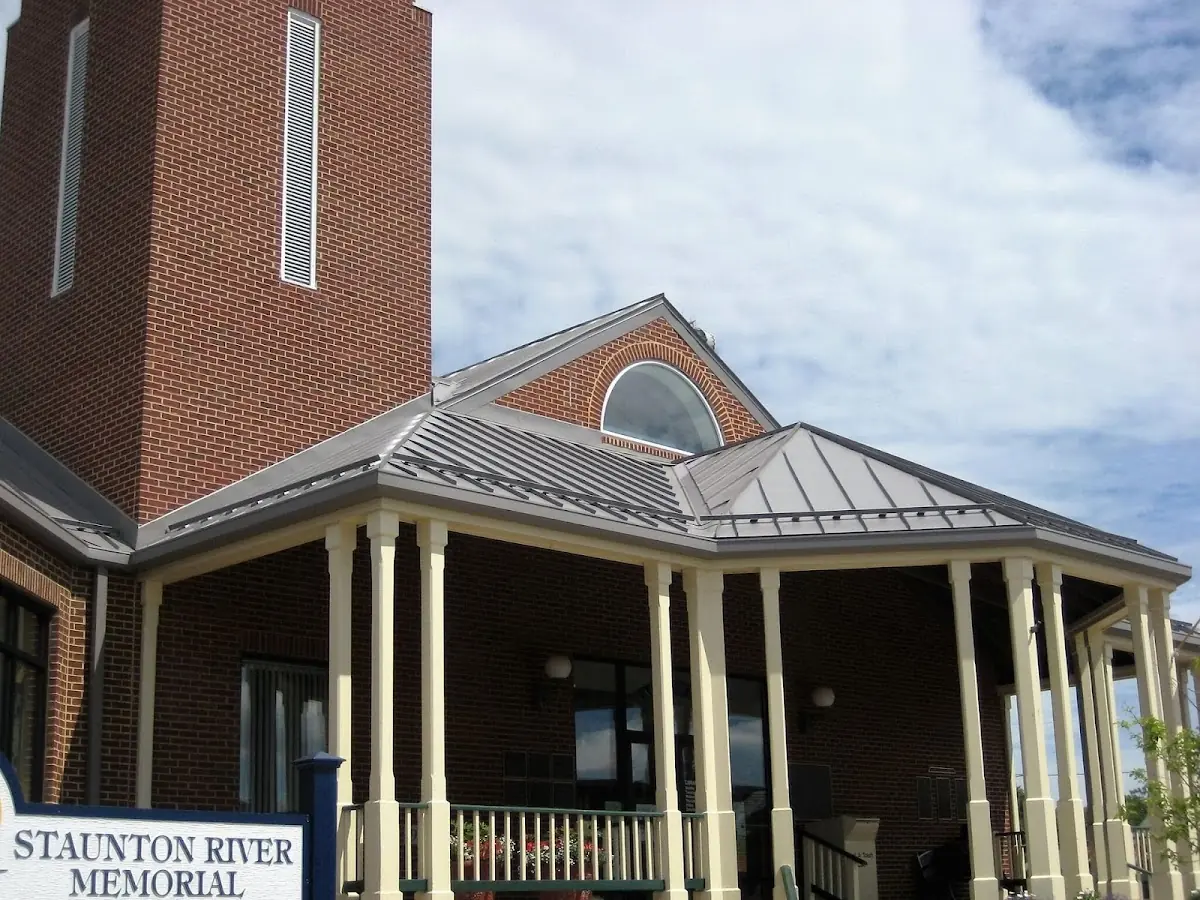 Skilled roofing craftsmen working on a residential roof in Nicholasville
